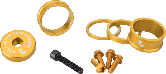 Wolf Tooth Headset BlingKit spacers, top cap and bolts in gold