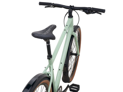 kona dew dl aluminum hybrid bike light green close up view from behind bike