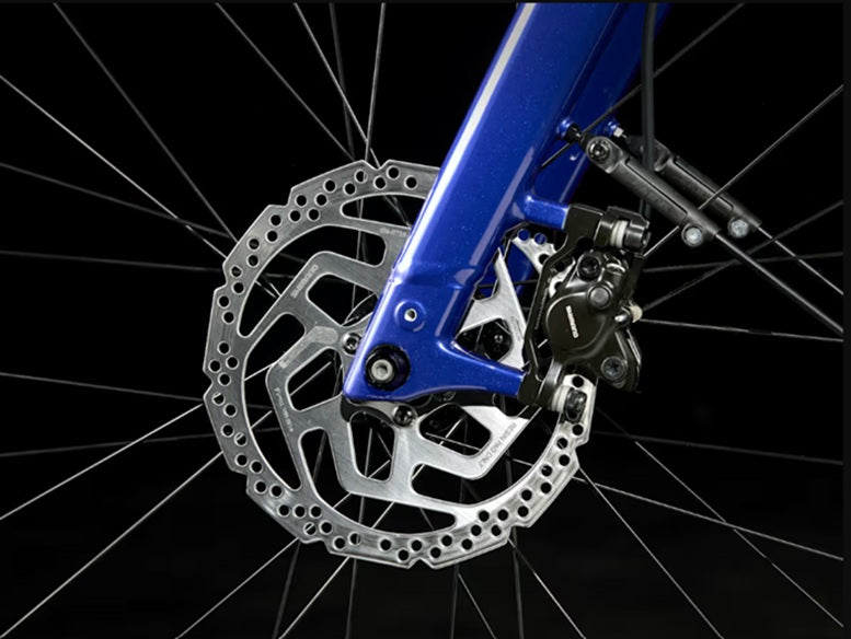 trek verve+ 3 aluminum 9 speed lowstep active e-bike close-up on disc brakes